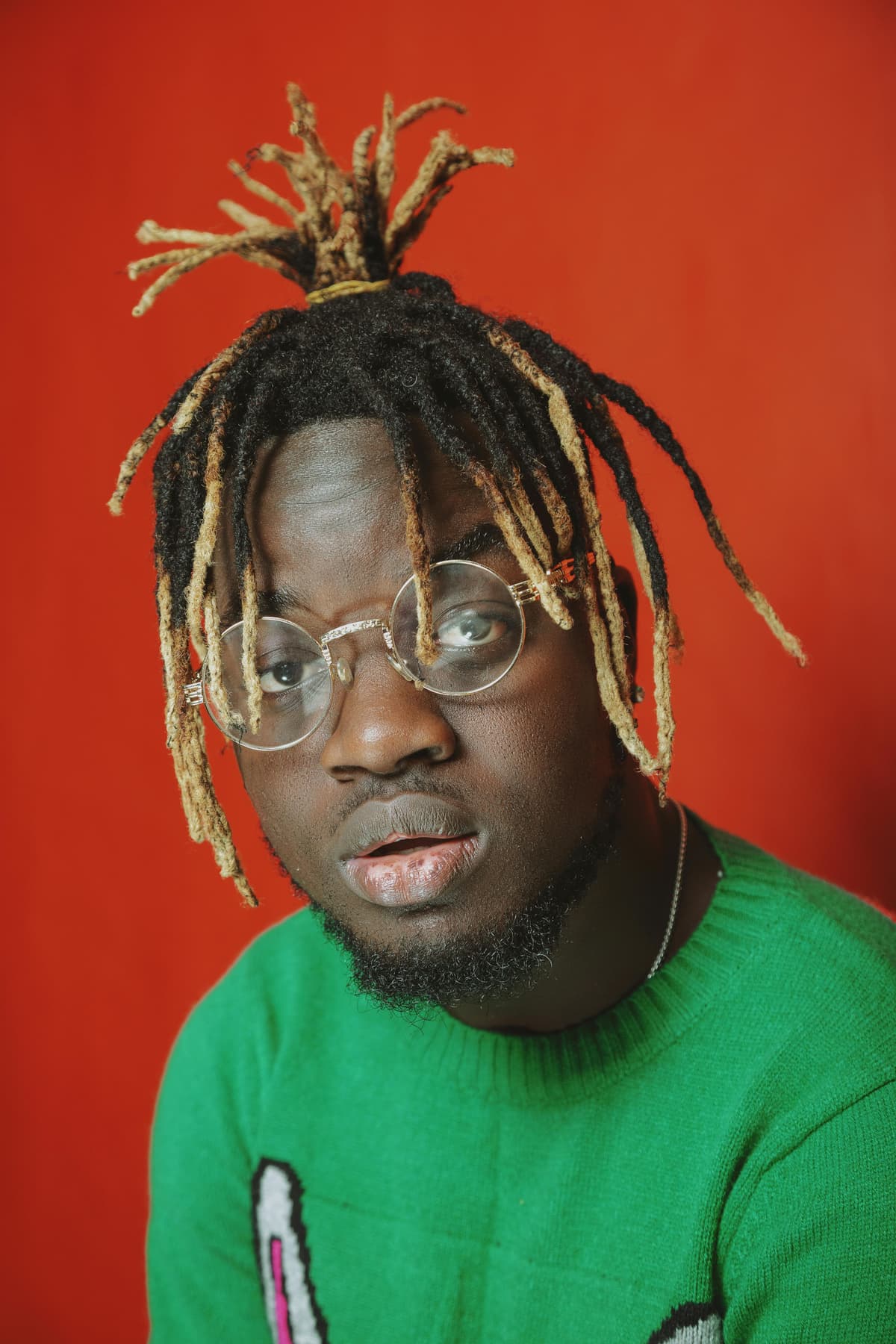 A stylist showing off their work